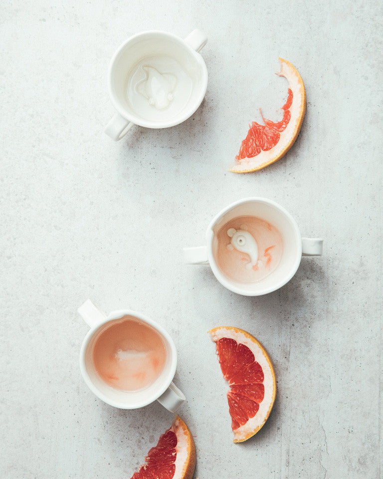 Our version of the classic kiddie cup! Each one has a little hand-made creature in the bottom. Notre version de la tasse enfantine classique! Au fond de chaque tasse se trouve une petite créature dessinée à la main.